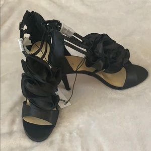 Black 3” heels from NY & Co.  Brand new.